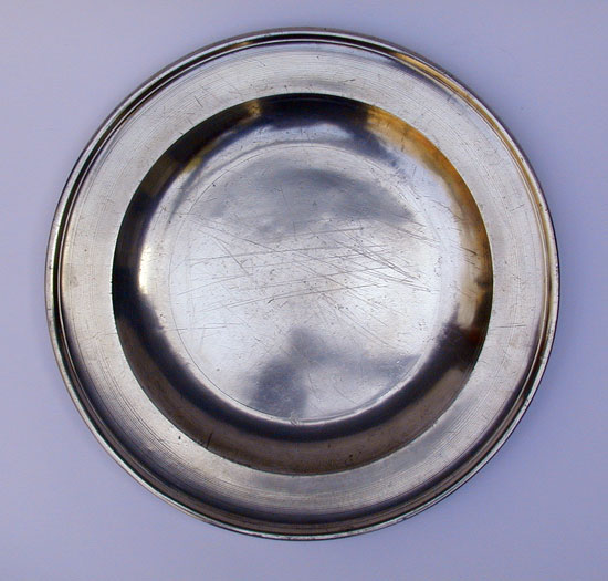 A Large Pewter Platter by Thomas & Townsend Compton