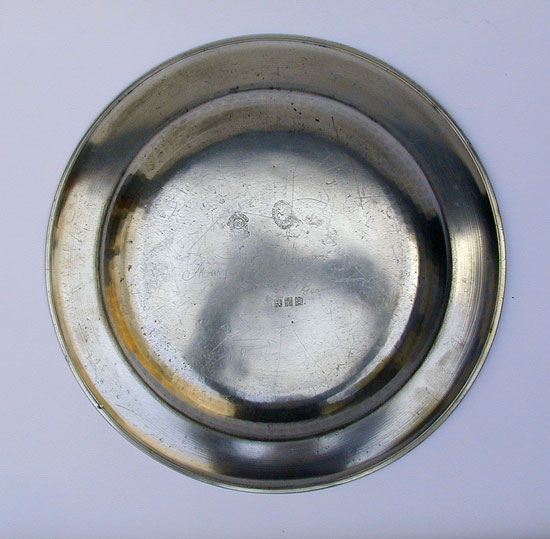 A Large Pewter Platter by Thomas & Townsend Compton