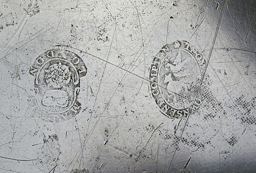 A Large Pewter Platter by Thomas & Townsend Compton