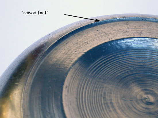 A Pewter Flower Handle Porringer with a Most Unusual Foot