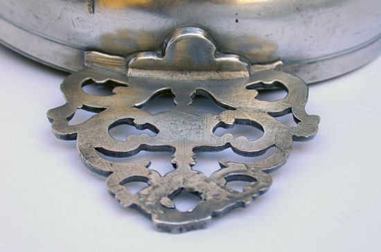 A Pewter Flower Handle Porringer with a Most Unusual Foot