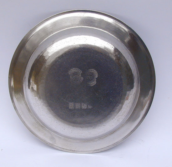 A Pewter Soup Plate by Townsend & Compton