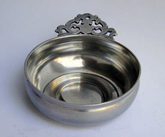 A Small Flower Handled Pewter Porringer Attributed to Wm Billings