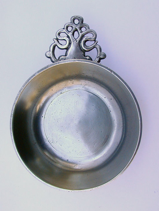 An Unmarked Pewter Basin Bowl Porringer with 