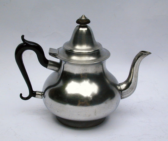 A Unmarked American Pewter Extended Foot Pear Form Teapot