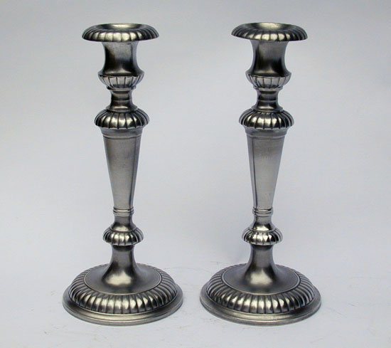 A Pair of Tall Gadrooned Pewter Candlesticks