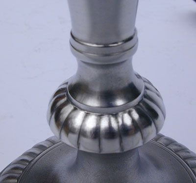 A Pair of Tall Gadrooned Pewter Candlesticks