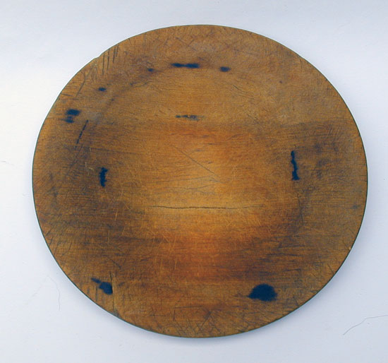 A Heavily Used Treenware Plate