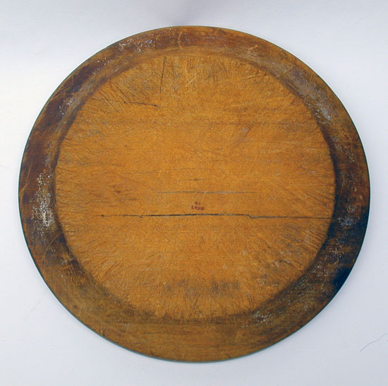 A Heavily Used Treenware Plate