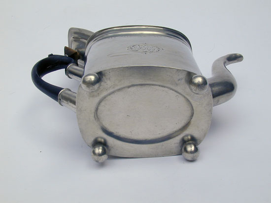 An Unmarked Ball Foot Bright Cut Engraved Teapot