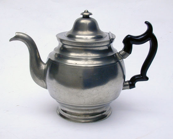 A Pewter Inverted Mold Pewter Teapot by J.B. Woodbury