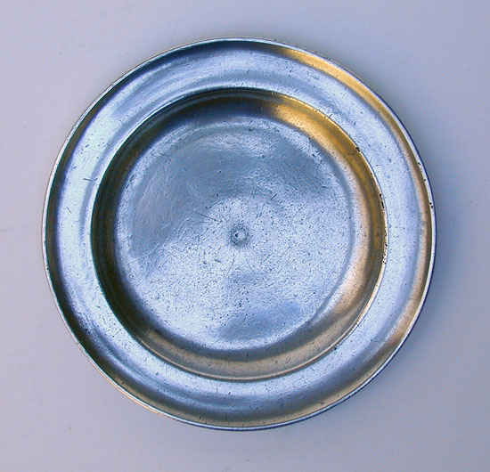 An Unmarked American Pewter Butter Plate