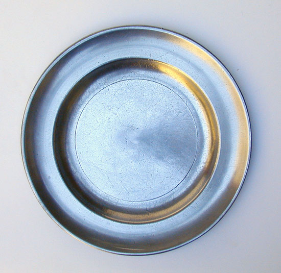 An American Smooth Rim Pewter Plate by 