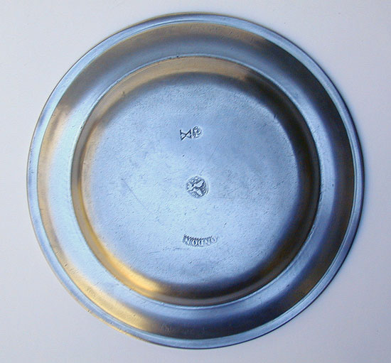 An American Smooth Rim Pewter Plate by 