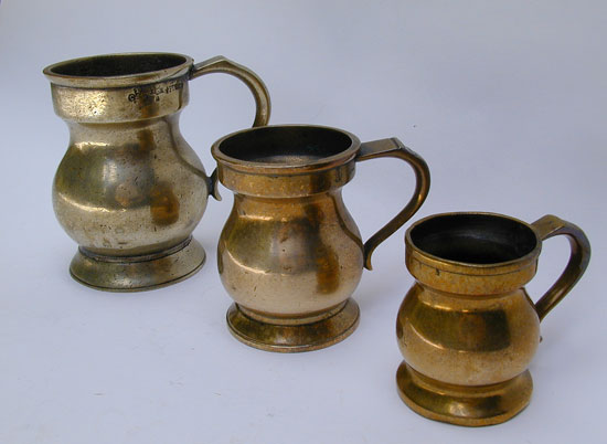 An Assembled Set of Three Brass Bellied Measures