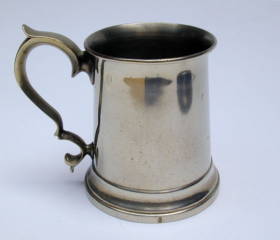 A Brass English Mug with Double 