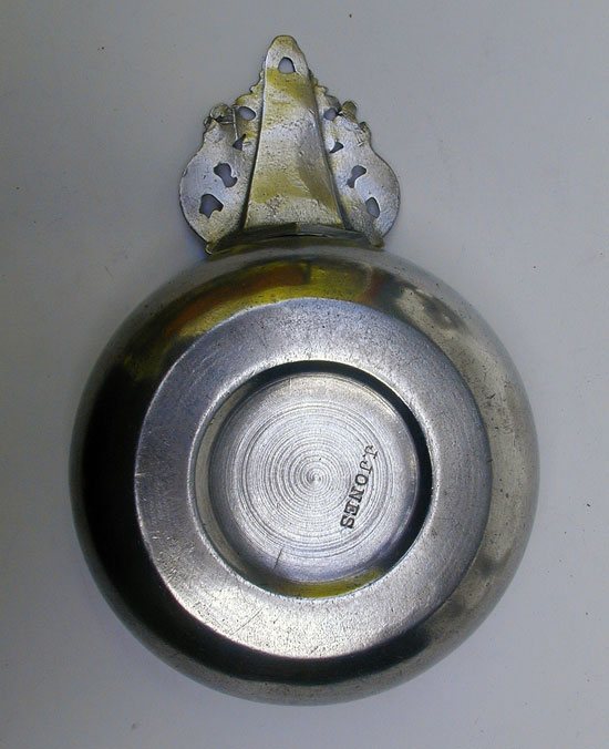A Scarce Unmarked American Pewter Spline Handle Porringer from the Belcher/Danforth Molds