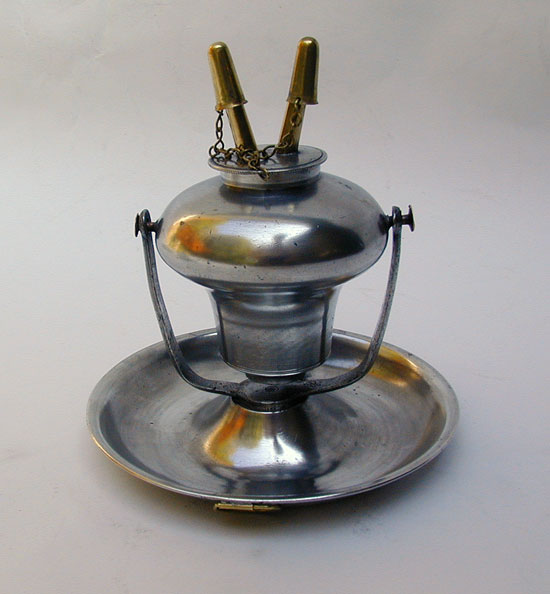 An Antique American Pewter Swivel Fluid Burning Lamp