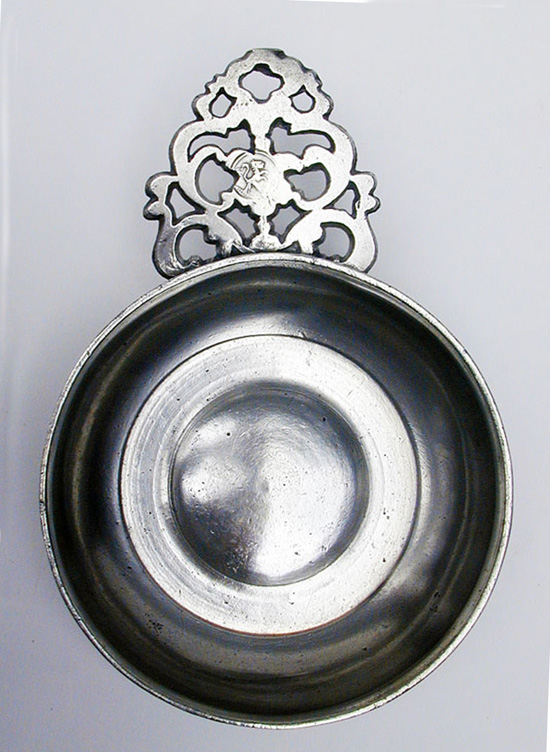 A Fine Large Flower Handle Porringer by Gershom Jones