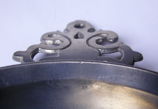 An Old English Handle Porringer by Frederick Bassett