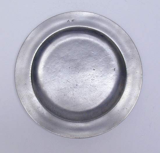 A Scarce Flat-Rim Plate by Cornelius Bradford