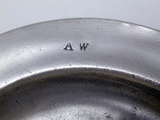 A Scarce Flat-Rim Plate by Cornelius Bradford