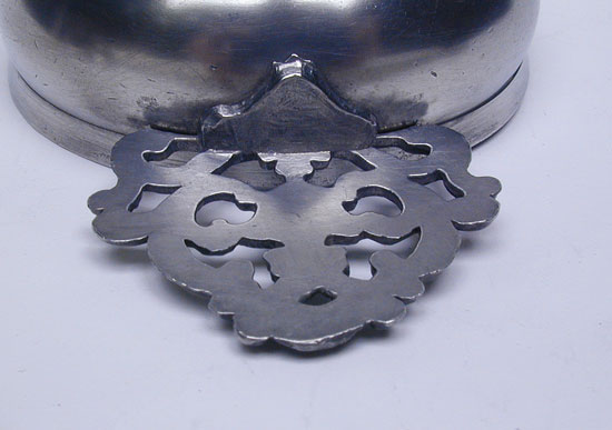 An Unmarked Petite Rhode Island Flower Handle Porringer