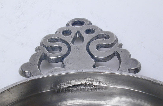 A Diminutive Old English Handle Porringer