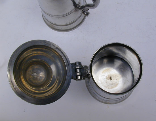 A Very Fine Pair of English Export Pewter Flagons by Robert Bush.