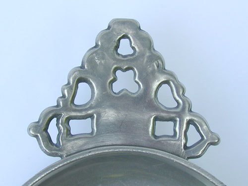An Unmarked English or American Geometric Handle Porringer
