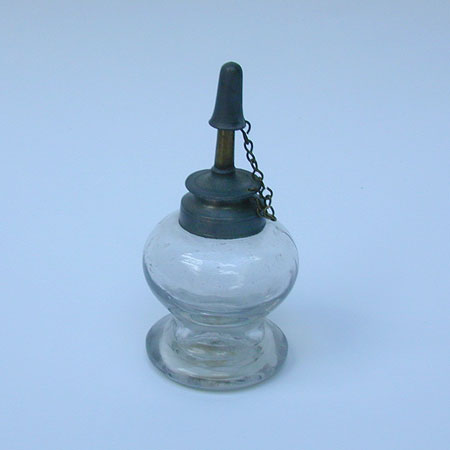 A Blown Glass Font Lamp with Pewter Collar and Burner