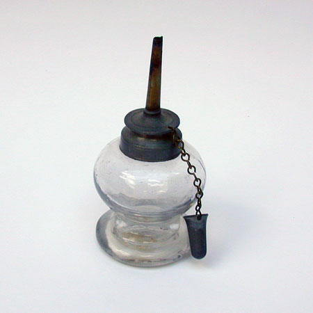 A Blown Glass Font Lamp with Pewter Collar and Burner