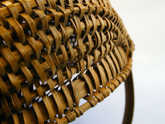 A Late 19th early 20th Century Buttocks Basket