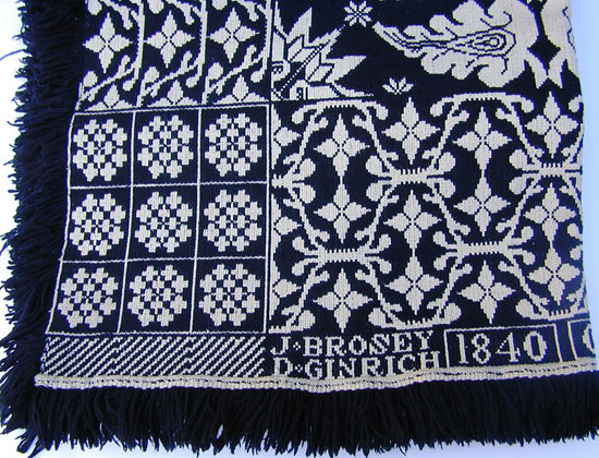 A Blue and White Coverlet by J. Brosy