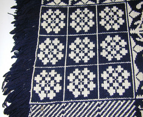 A Blue and White Coverlet by J. Brosy