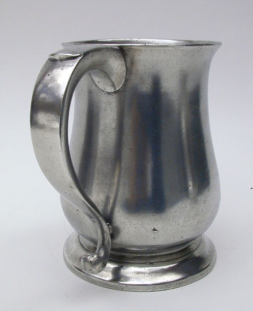 An Unmarked English Pewter Export Quart  Tulip Mug