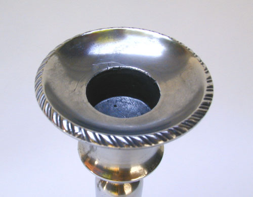 A Pair of Rope Border Decorated English Push-Up Candlesticks