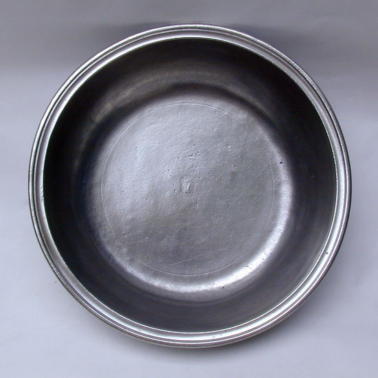 A Large Hammered Basin by Hale & Sons