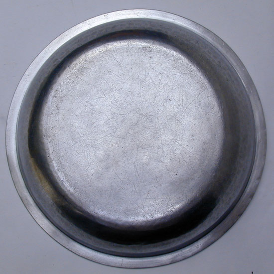 A Large Hammered Basin by Hale & Sons