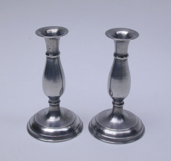 A Pair of Miniature Pewter Candlesticks
