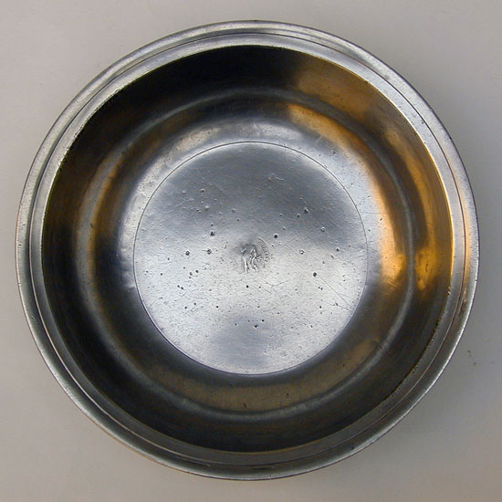 A Hammered Pewter Basin by Edgar Curtis & Co.