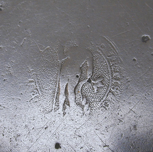 A Hammered Pewter Basin by Edgar Curtis & Co.