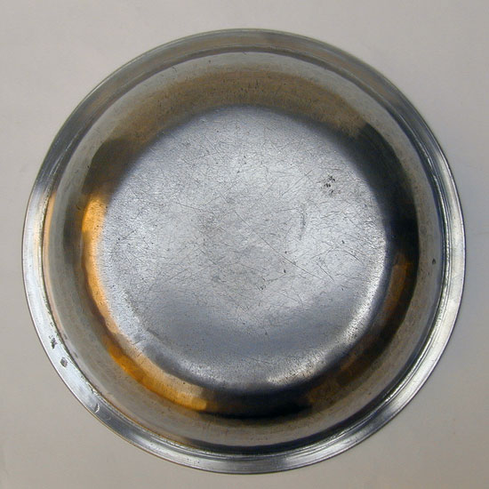 A Hammered Pewter Basin by Edgar Curtis & Co.