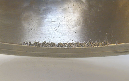 A Hammered Pewter Basin by Edgar Curtis & Co.
