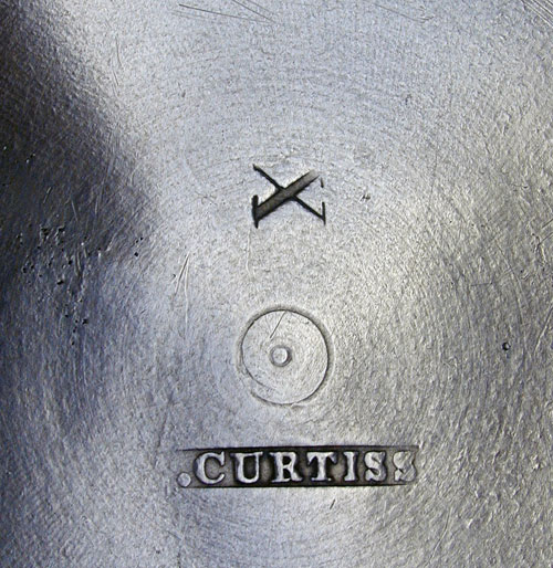 An Inverted Mold Pewter Teapot by I. Curtiss