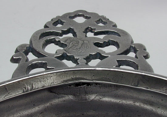 A Pewter Flower Handle Porringer by Samuel E. Hamlin