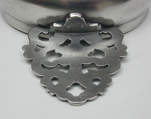 A Pewter Flower Handle Porringer by Samuel E. Hamlin