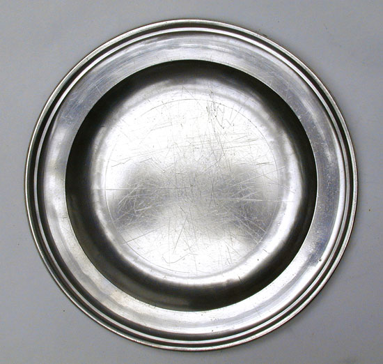 A Pewter Export Single Reed Rim Plate by Thomas & Townsend Compton