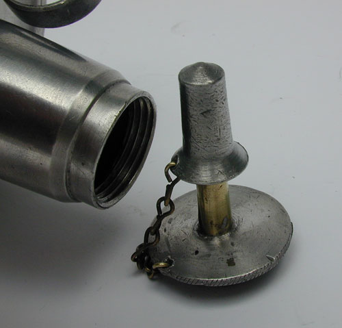 A Pewter Cylinder Font Sparking Lamp