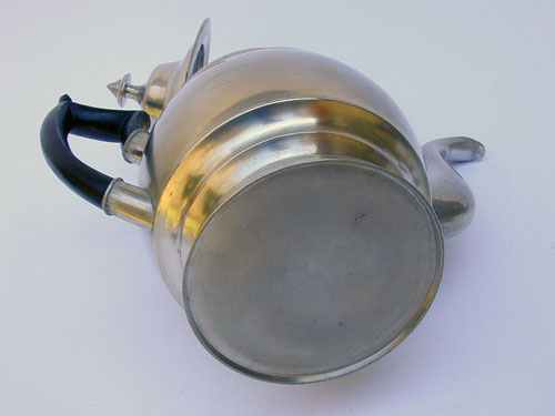 An Unmarked Antique American Pewter inverted Mold Teapot